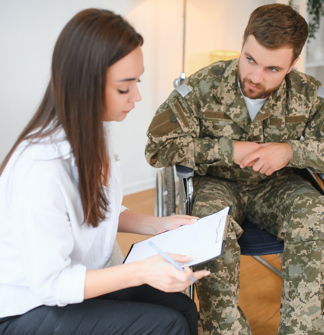 Veteran reviewing VA claim documentation with expert guidance